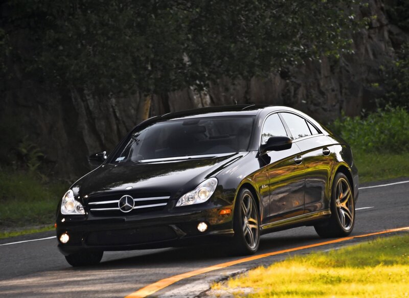 black mercedes-benz cls on road