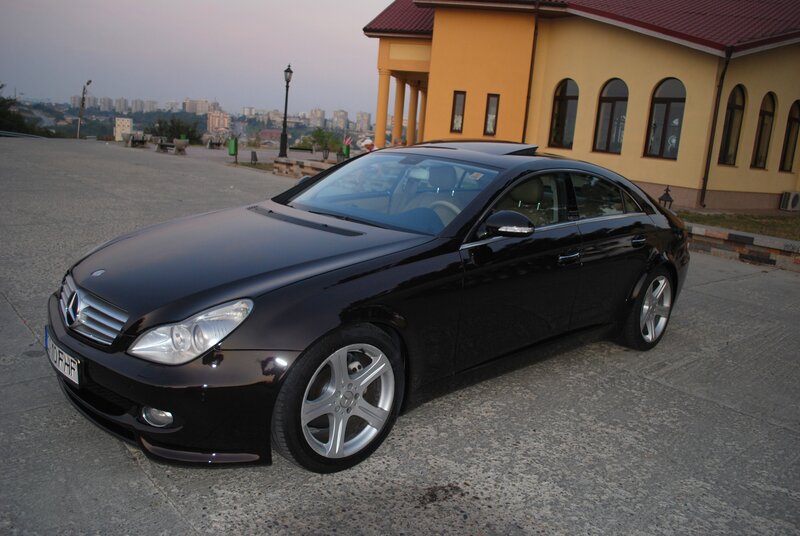 black mercedes-benz cls parked