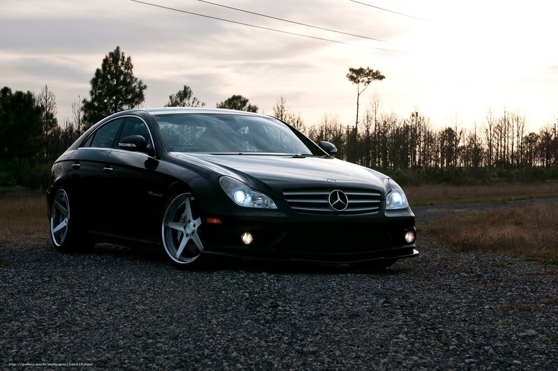 Black Mercedes-Benz CLS parked at dusk
