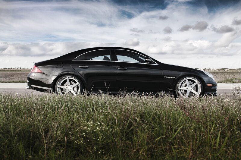 Black Mercedes-Benz CLS parked on roadside