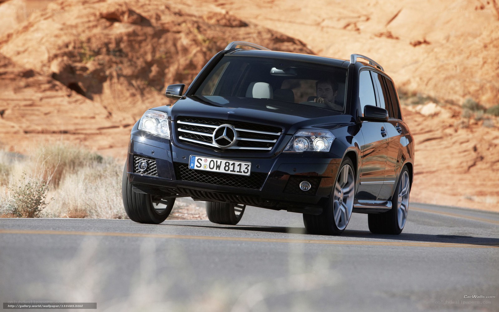 Black Mercedes-Benz GLK driving on road