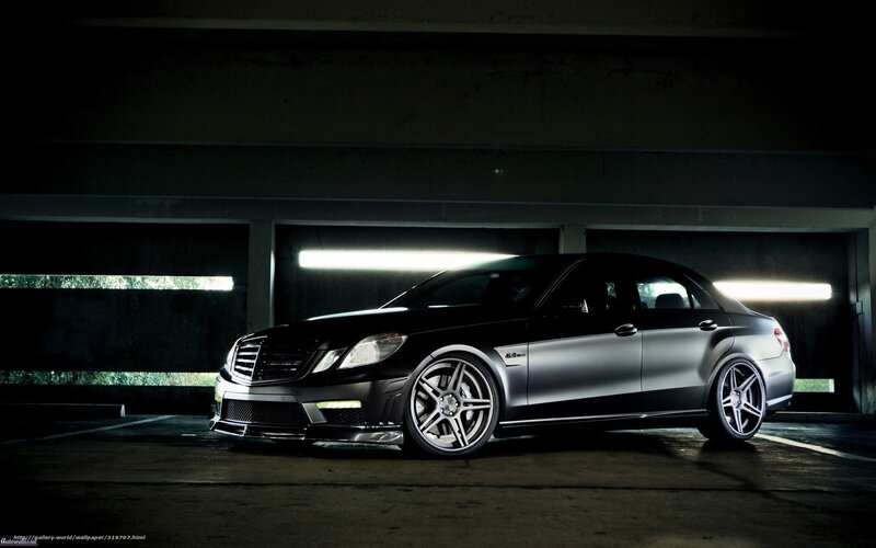 black mercedes-benz in garage