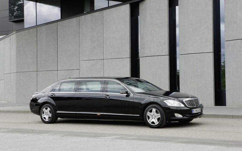 black mercedes-benz limousine