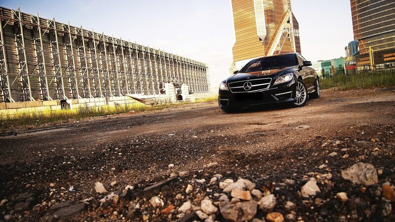 Black Mercedes-Benz on a construction site