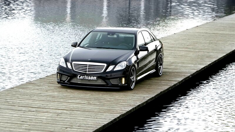 Black Mercedes-Benz on a dock