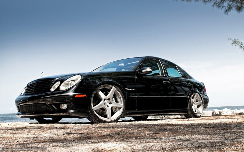 Black Mercedes-Benz on beach