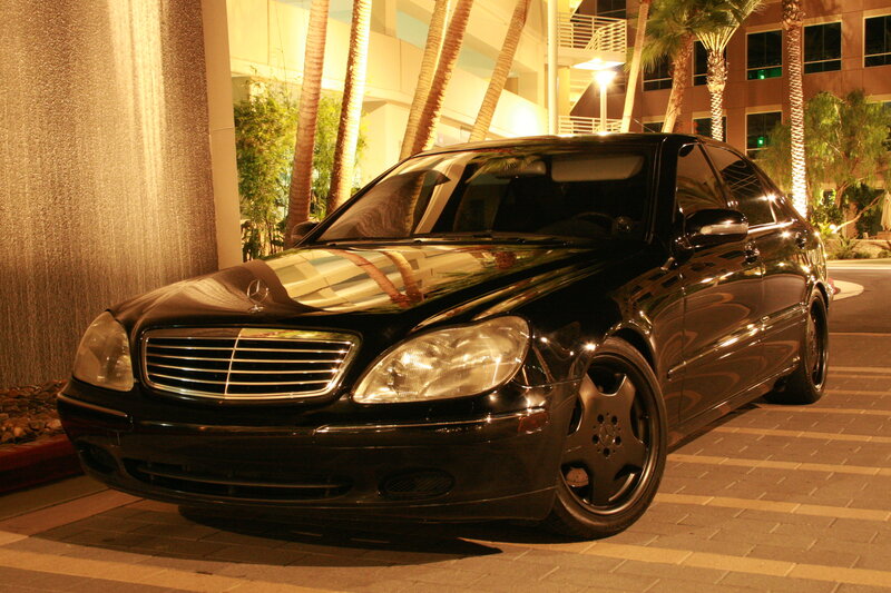 Black Mercedes-Benz parked at night