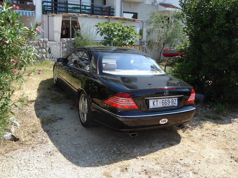 Black Mercedes-Benz parked outside