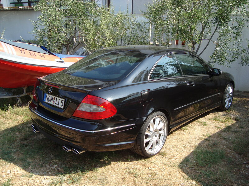 Black Mercedes-Benz parked outside