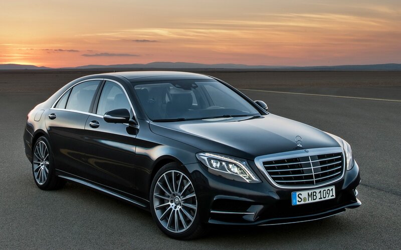 Black Mercedes-Benz S-Class at sunset