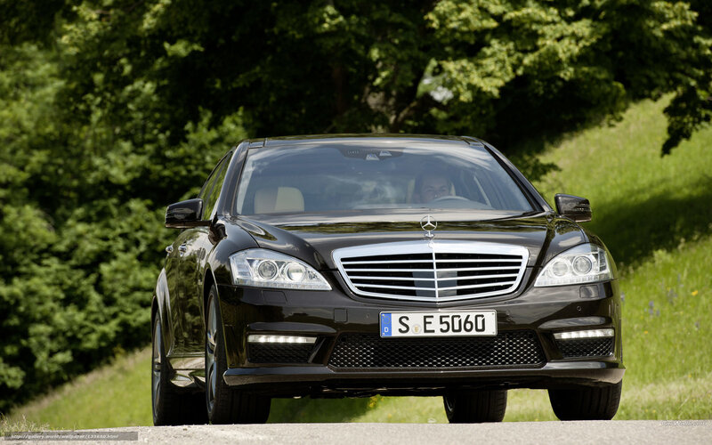 Black Mercedes-Benz S-Class on a road