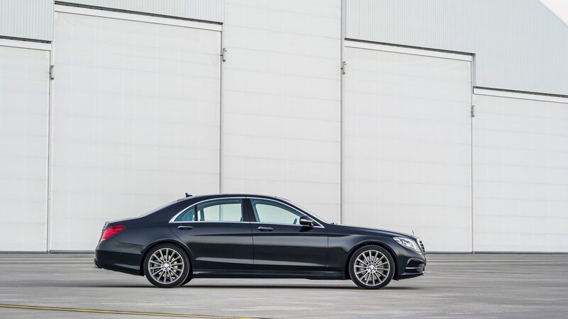 black mercedes-benz s-class sedan