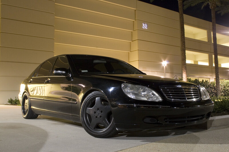 black mercedes-benz s500 at night