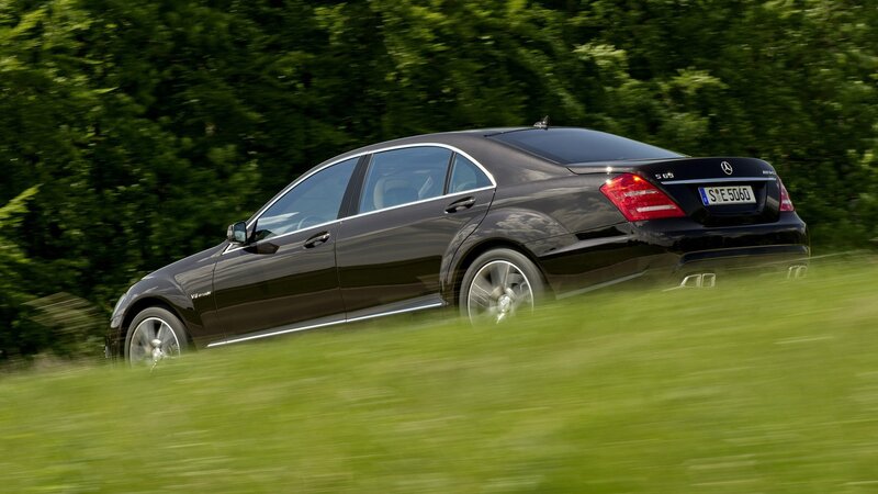 black mercedes-benz s63 amg driving