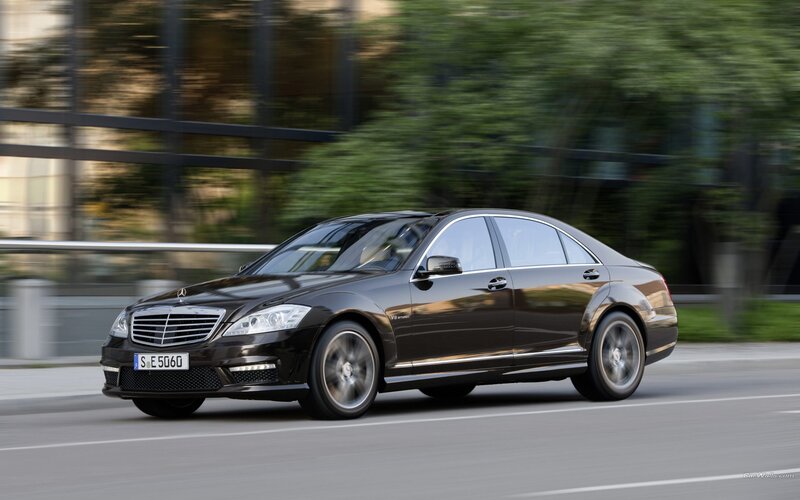 black mercedes-benz s63 amg in motion