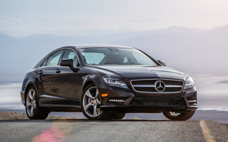 black mercedes-benz sedan