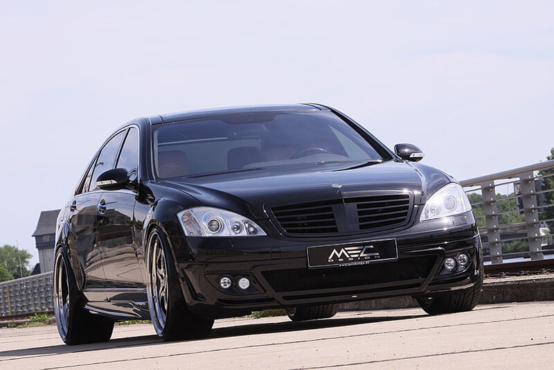 black mercedes-benz sedan