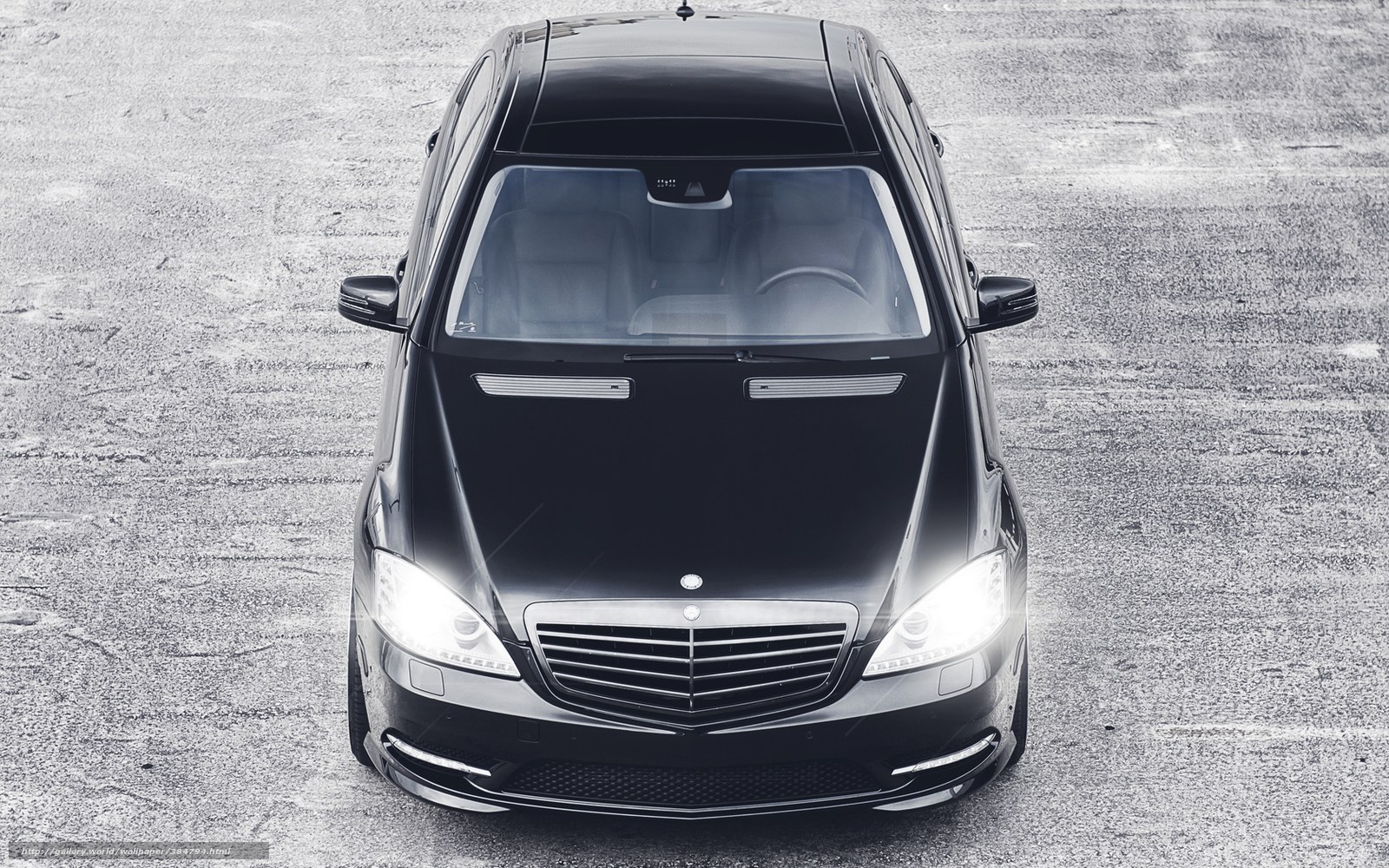 black mercedes-benz sedan