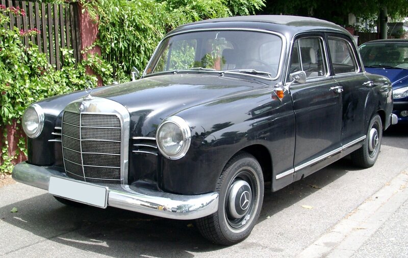 black mercedes-benz sedan