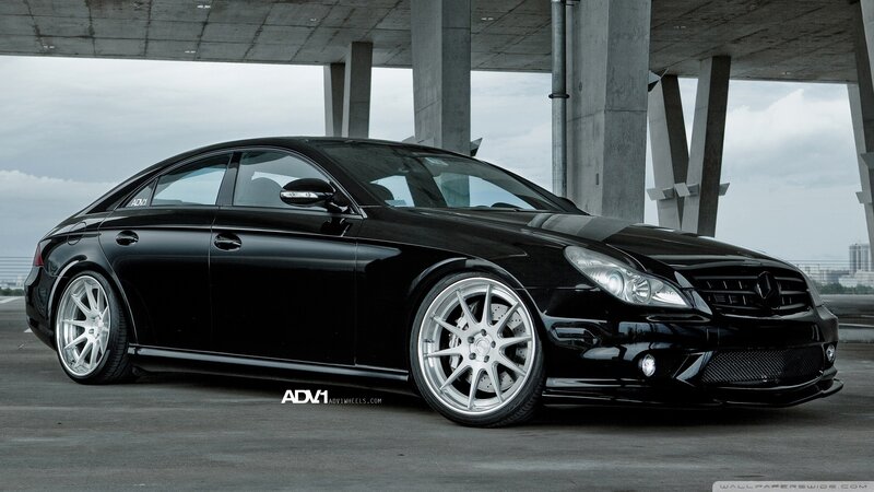 black mercedes-benz sedan