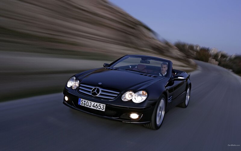 Black Mercedes-Benz SLK driving