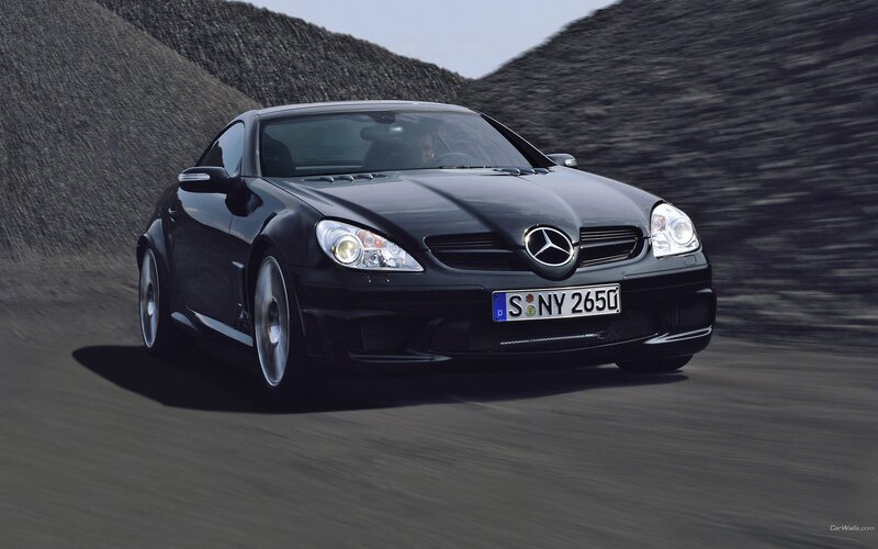 black mercedes-benz slk in motion