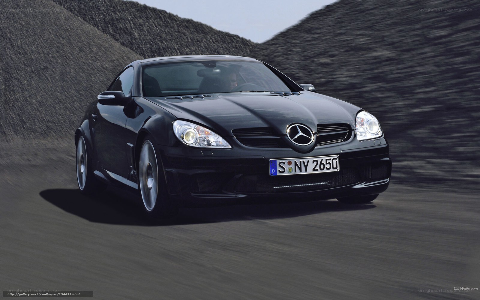 Black Mercedes-Benz SLK in motion