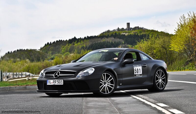 Black Mercedes-Benz SLR on a road