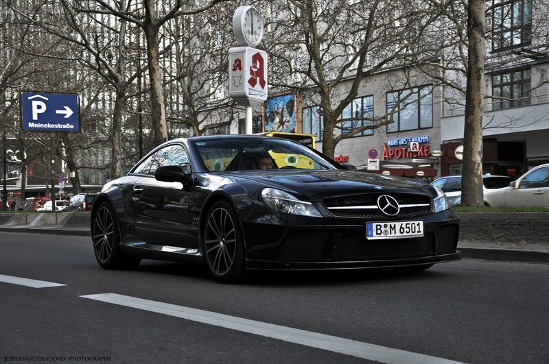 Black Mercedes-Benz SLR on city street