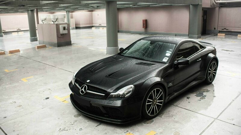 Black Mercedes-Benz SLR parked
