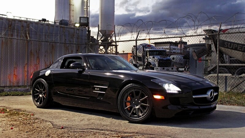 Black Mercedes-Benz SLS AMG in industrial area