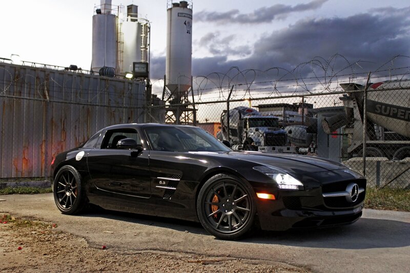 Black Mercedes-Benz SLS AMG in industrial area