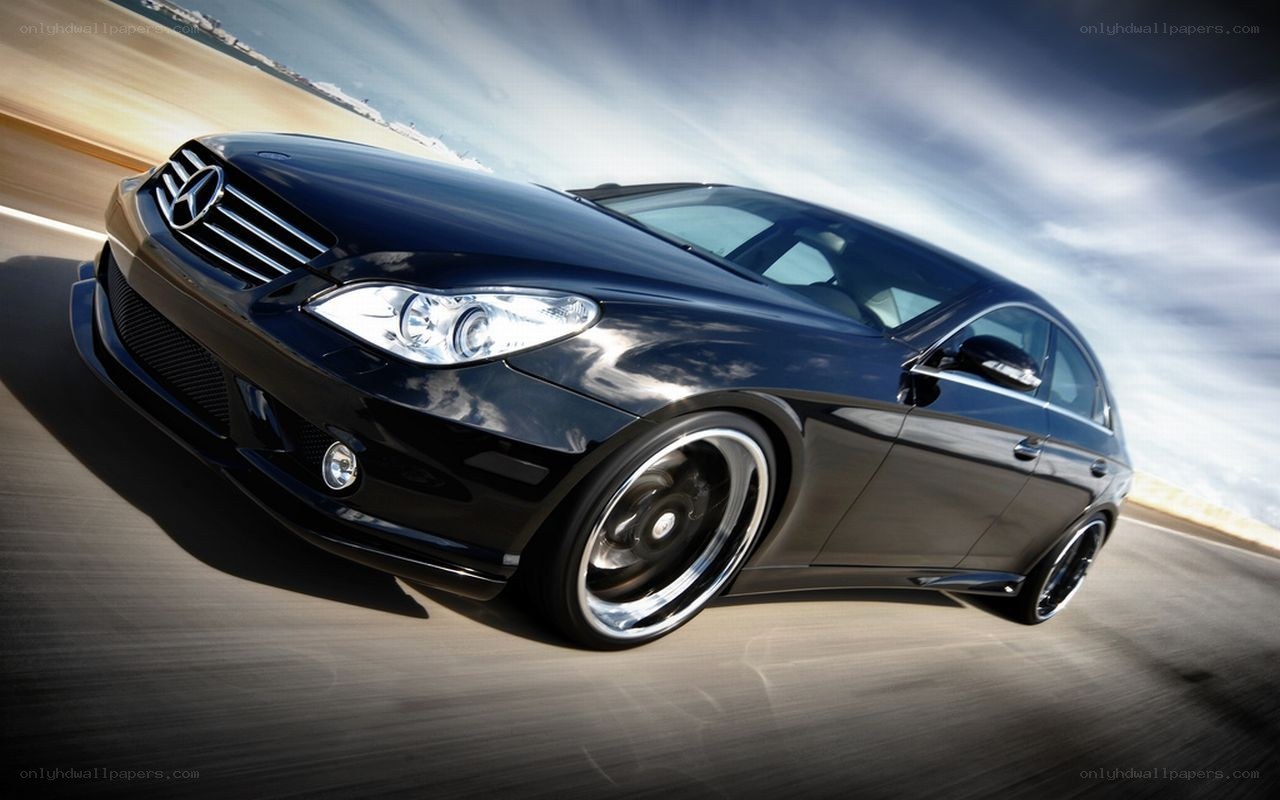 black mercedes-benz speeding