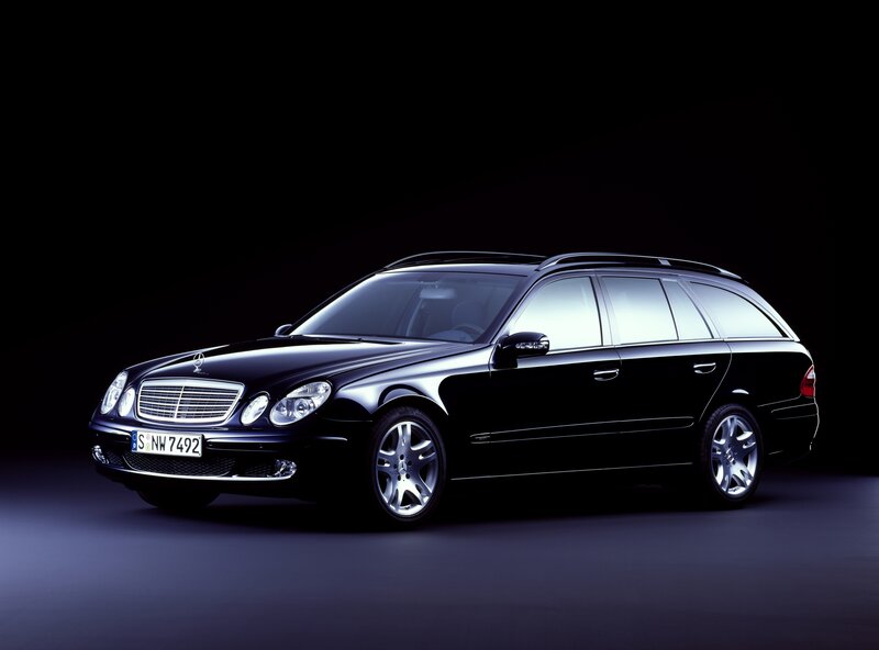 black mercedes-benz station wagon