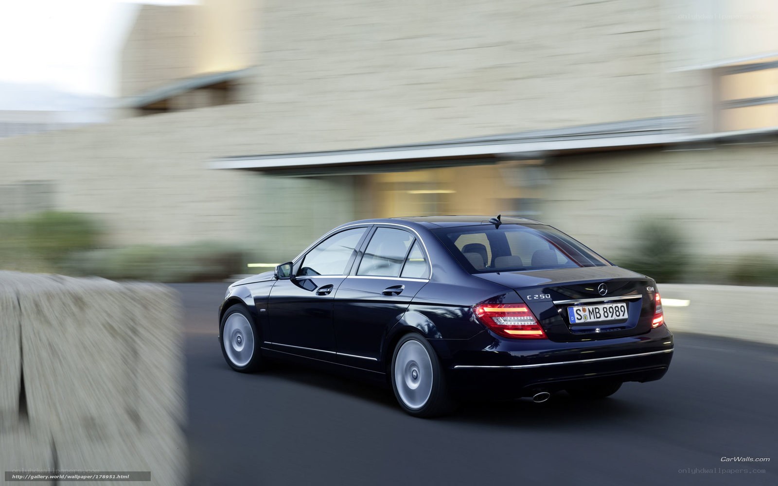black mercedes c250 in motion