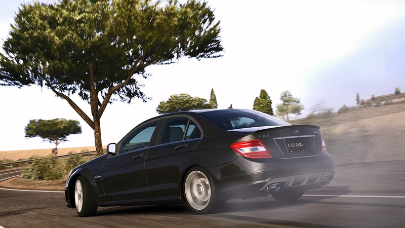 black mercedes c63 amg driving