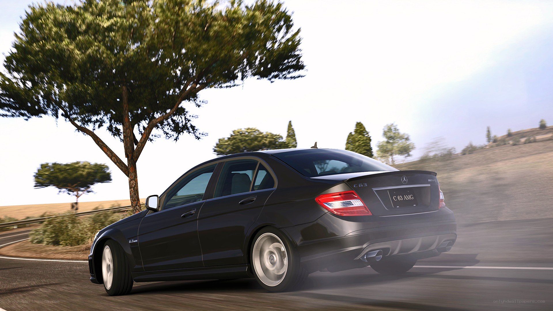black mercedes c63 amg driving