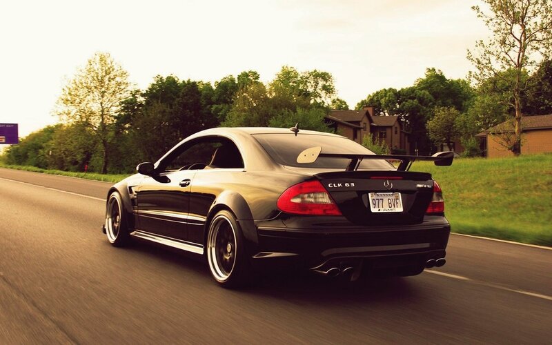 black mercedes clk63 on road