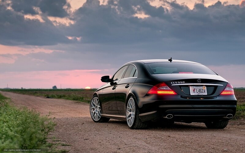 Black Mercedes CLS 550 at sunset
