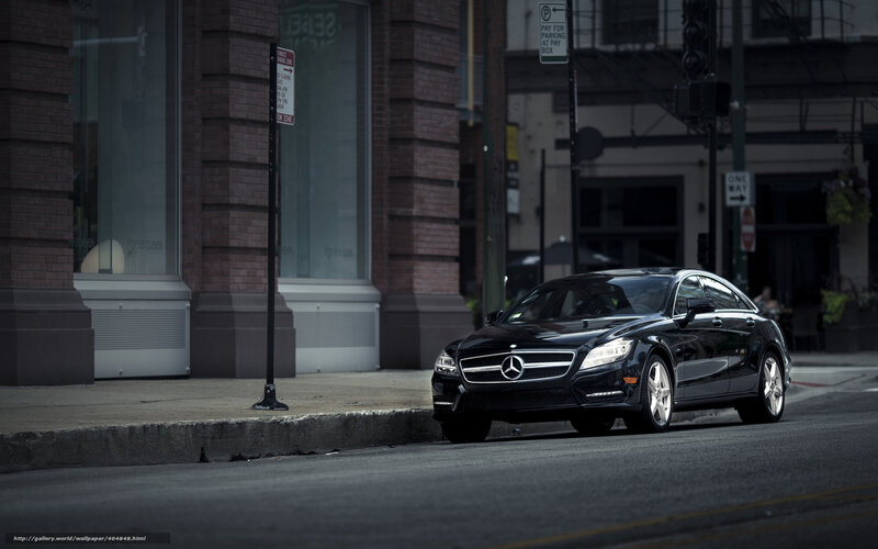 Black Mercedes on city street