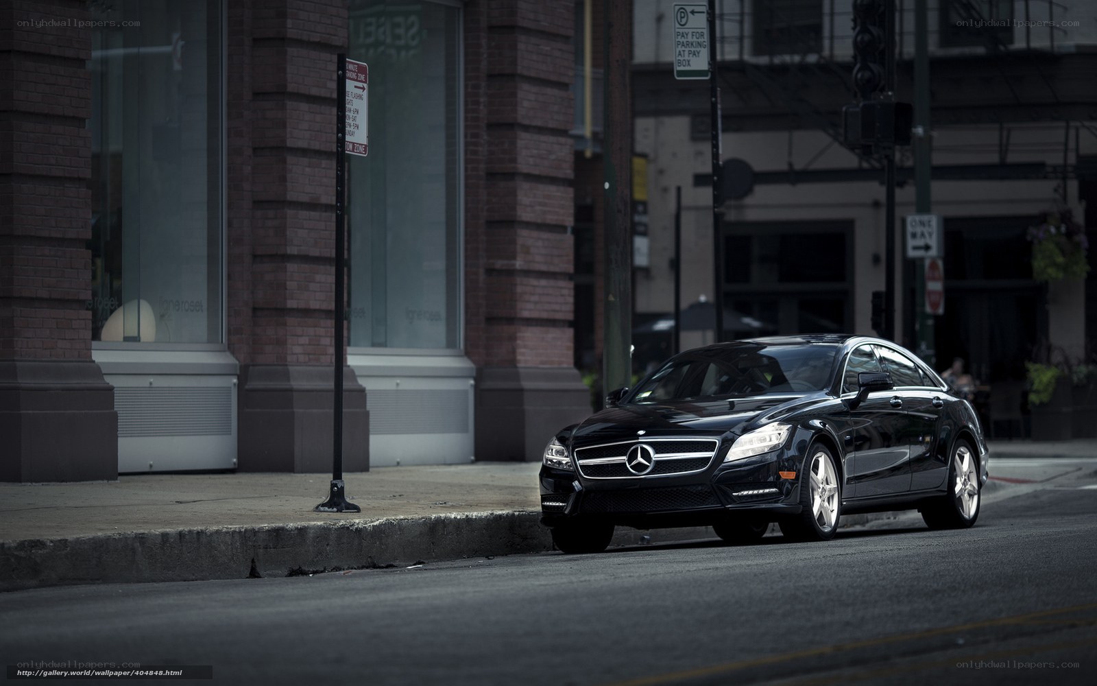 Black Mercedes on city street
