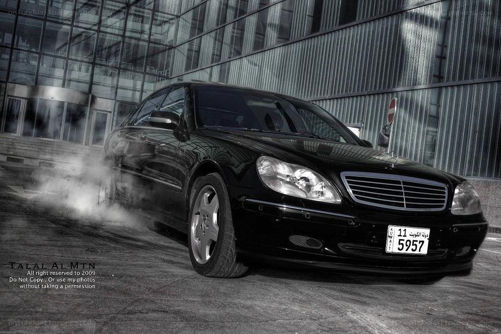 Black Mercedes performing burnout