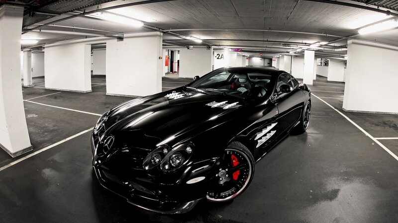 Black Mercedes SLR in parking garage