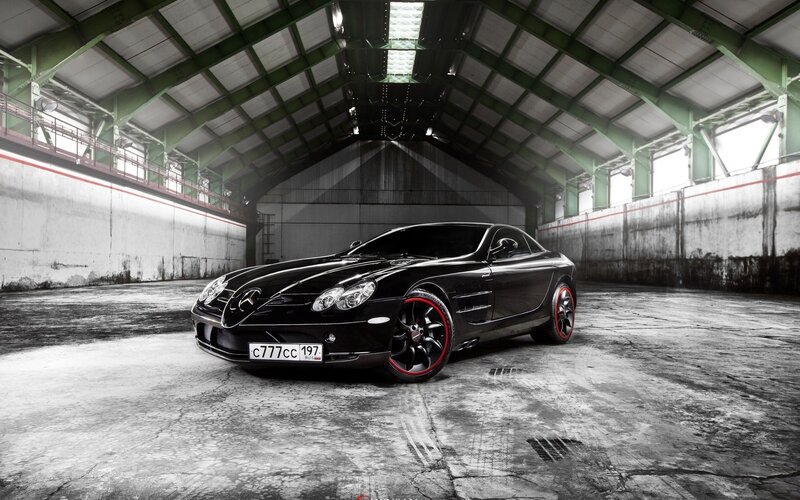 Black Mercedes SLR in warehouse