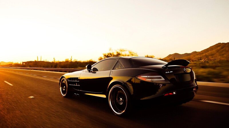 black mercedes slr on highway