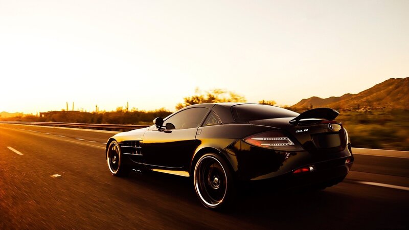 black mercedes slr on highway