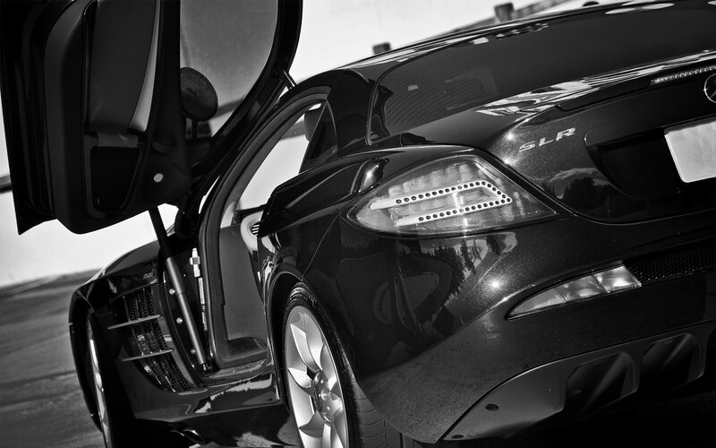 Black Mercedes SLR with open door