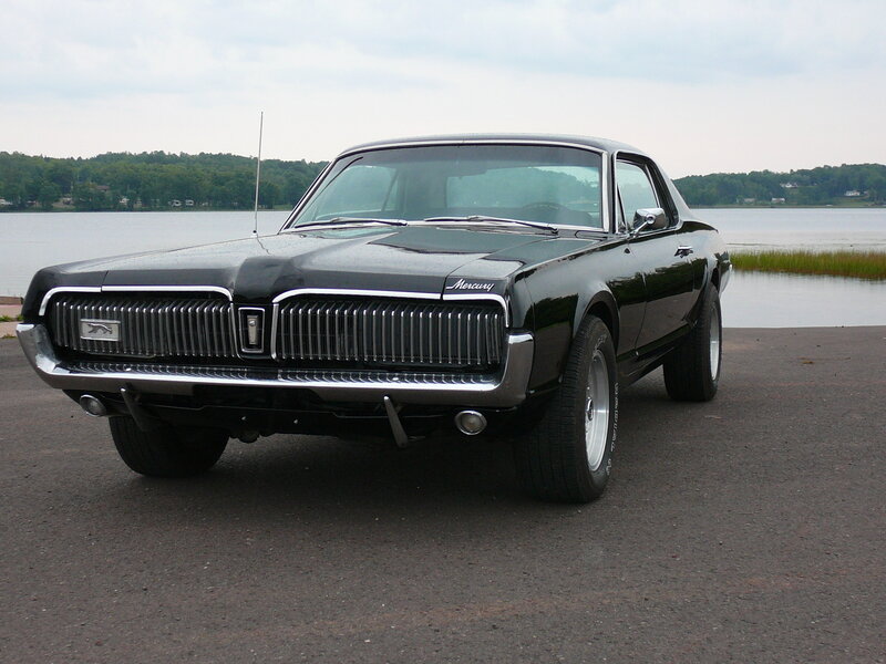 Black Mercury Cougar by the lake