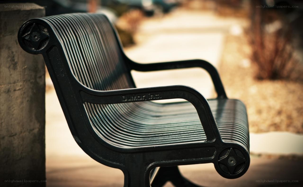 black metal bench in park