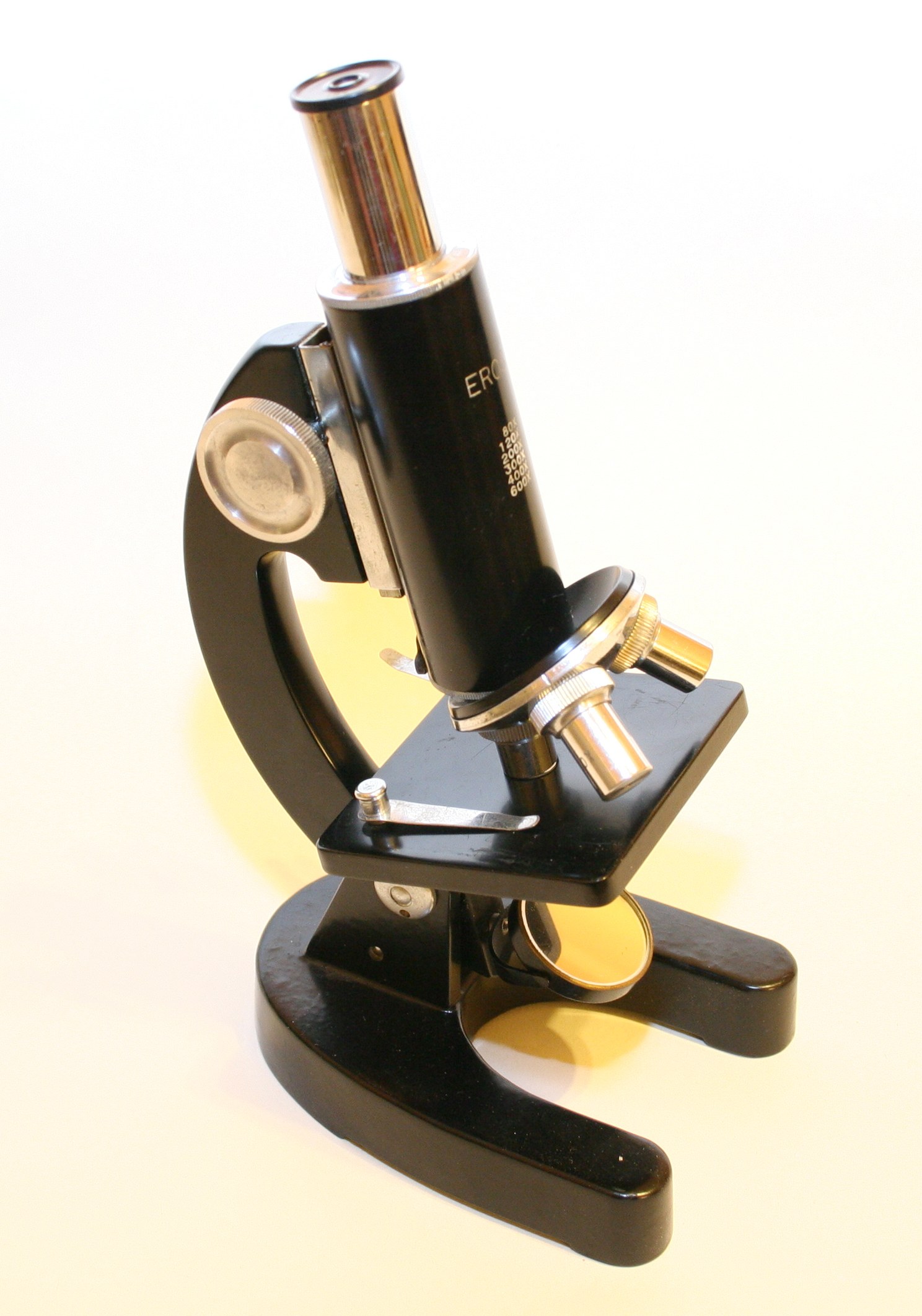 black microscope on white